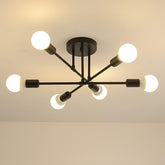 Modern ceiling light fixture with six light bulbs on a plain background